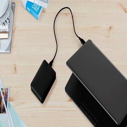 Disque dur portable Western Digital Elements 2TB USB 3.0, boîtier noir avec connecteur USB visible, pour stockage externe.