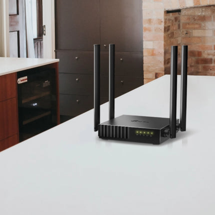 Routeur Tplink Archer Ac1200 C54 avec antennes dual-band, design compact, ports Ethernet et indication LED.